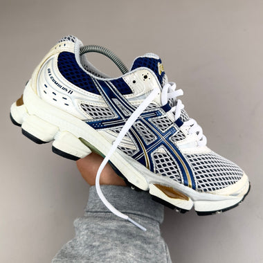GEL Nimbus 16 — Crème / Marine / Doré