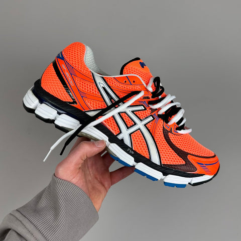 GEL Nimbus 16 — Orange / Blanc